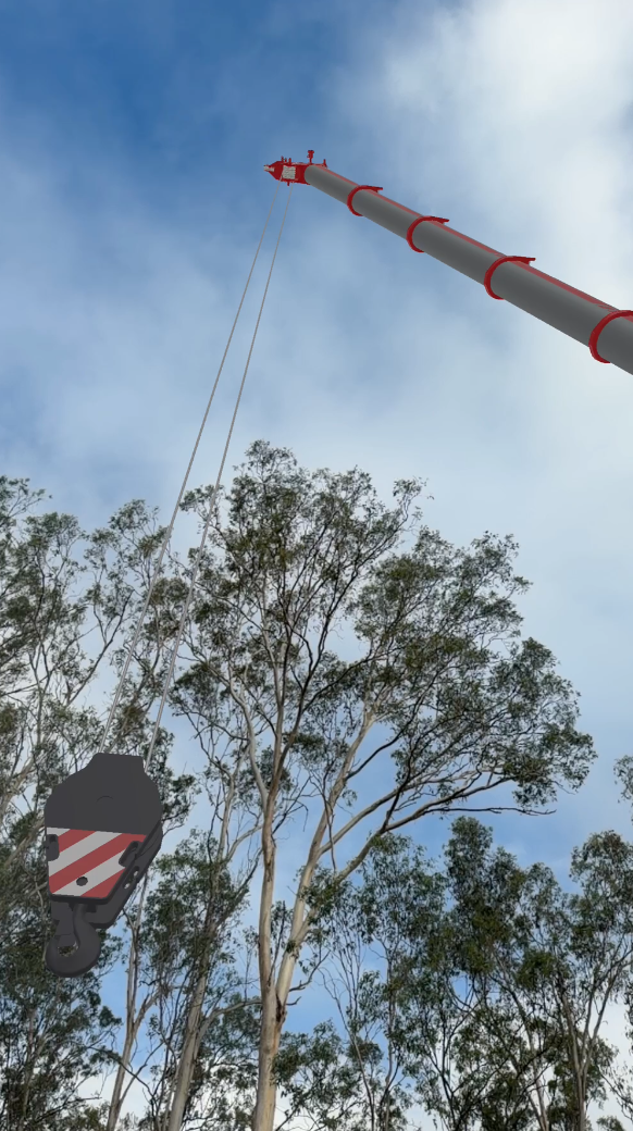 VisualQuip AR screenshot showing a crane boom and hook block against trees and daylight sky